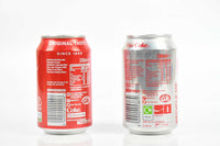 Damien Hirst, Pair of signed Coca-Cola cans, 2021