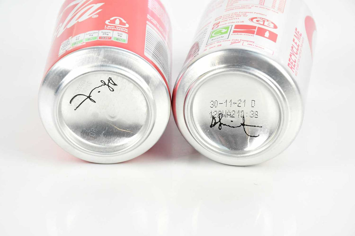 Damien Hirst, Pair of signed Coca-Cola cans, 2021