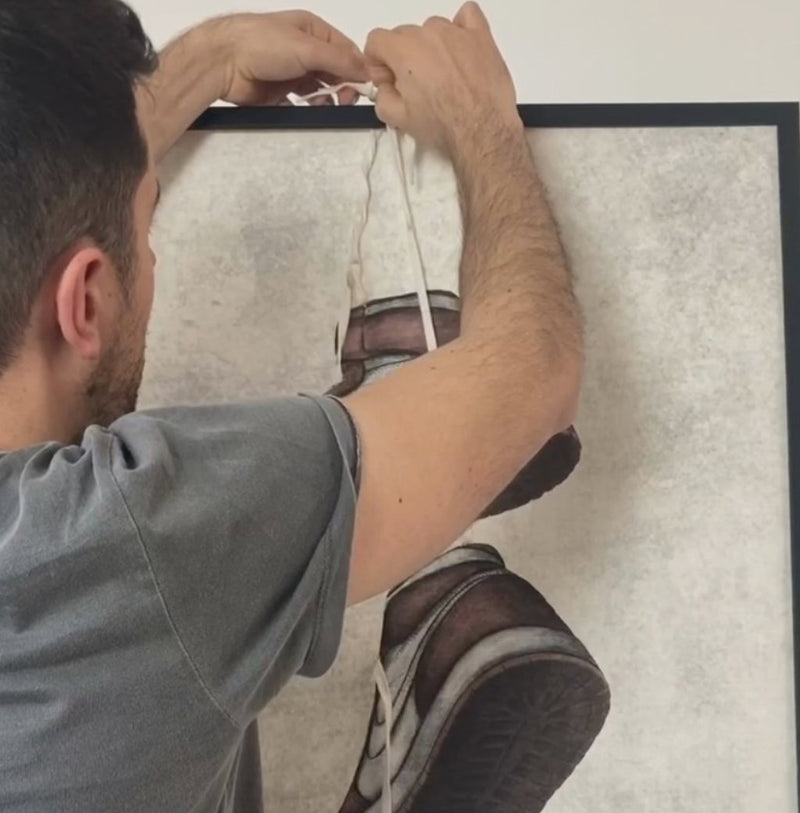 Andrew Scott with his artwork 