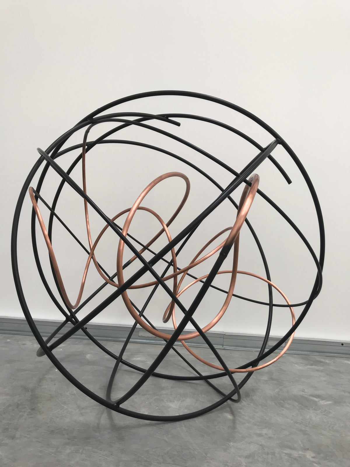 ransform your outdoor space with Mark Beattie's unique sculpture, Orbital XV. Crafted from polished copper and painted steel, this one-of-a-kind masterpiece stands at 90 x 90 x 90cm. The dynamic blend of materials and artistic flair make it a captivating addition to any outdoor setting. Elevate your exterior design with the industrial elegance of Orbital XV, where craftsmanship meets durability in perfect harmony