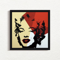 an image of an artwork by andy warhol titled Golden Marilyn 42 in black frame. the artwork features a black stencilled image of marilyn monroe's face on a background of gold, red, and white. this is a sunday b morning print