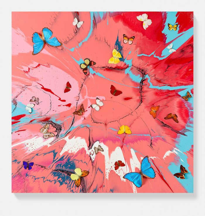 A Damien Hirst square abstract art print featuring a vibrant pink and red fluid paint background with splashes of light blue, white, and black, decorated with numerous small colourful butterflies in yellow, blue, brown, and white.