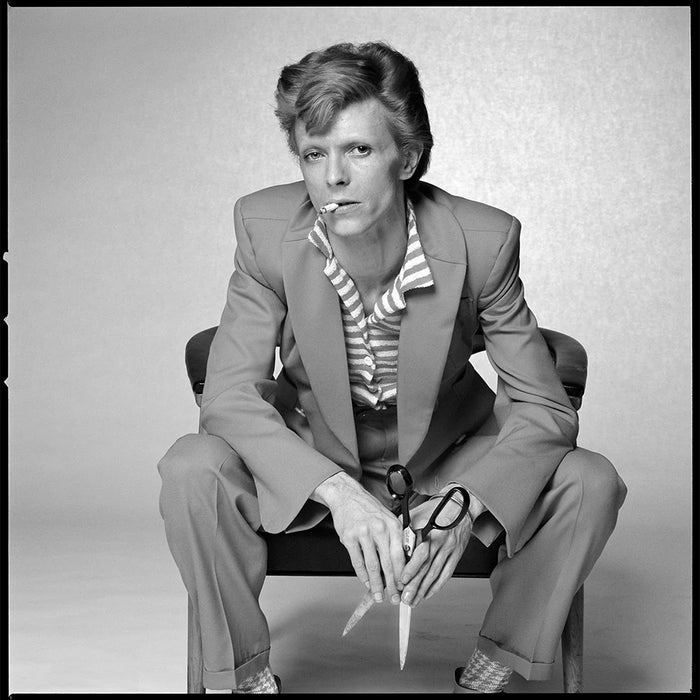 Terry O'Neill, David Bowie in a mustard Burretti suit, 1974