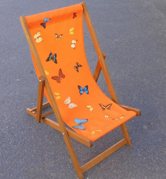 Damien Hirst Orange Deck Chair Apart from their rich association with childhood, butterflies are symbols of freedom and thus represent escape; death (something of an obsession for Hirst) is the ultimate release. Each chair bears an aluminium plaque screwed to the frame, with Damien Hirst facsimile signature and trademarks and with just 250 in the limited edition, these deckchairs are extremely difficult to come by.