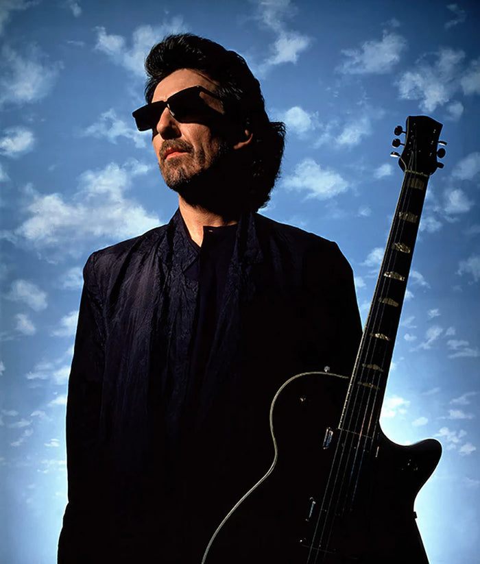 Gered Mankowitz, English guitarist, singer-songwriter, and producer George Harrison photographed in London, 1986 Limited edition fine art photograph by Gered Mankowitz, capturing iconic portraits of legendary musicians and cultural icons. Available at Smolensky Gallery