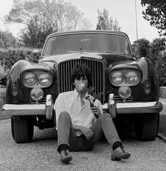 Gered Mankowitz, Keith Richards sitting in front of Blue Lena, 1966 Limited edition fine art photograph by Gered Mankowitz, capturing iconic portraits of legendary musicians and cultural icons. Available at Smolensky Gallery
