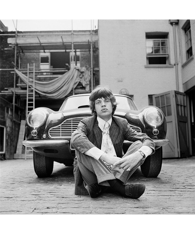 Gered Mankowitz, Mick Jagger with his Aston Martin DB6, 1966 Limited edition fine art photograph by Gered Mankowitz, capturing iconic portraits of legendary musicians and cultural icons. Available at Smolensky Gallery