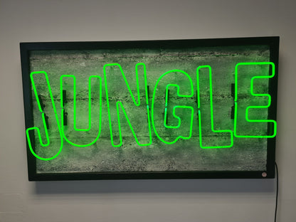 Immerse yourself in the vibrant energy of Tony Spink's Jungle. This one-of-a-kind artwork features lime green neon on a textured faux concrete backing panel, framed in black wood. Measuring 75 x 125 cm, this original masterpiece is a unique fusion of neon art and the lively spirit of the jungle. Elevate your space with this distinctive neon artwork, a bold addition to any art collection.