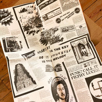 An image showing the printed reverse side of Jamie Reid's 'FUCK forever' artwork. The printed reverse state 'Anarchy is the key', 'do it yourself is the melody', and other punk motifs