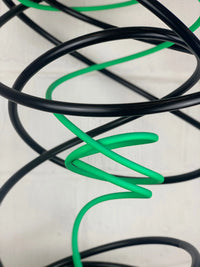 Mark Beattie's Green in Black Spiral, an extraordinary sculpture crafted from painted copper on a burnt plinth. Measuring 68 x 45 x 45 cm