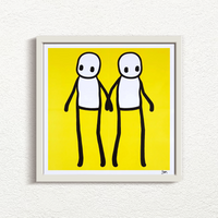 STIK_Holding_Hands_Signed_Yellow_2020_with white frame print for sale from Smolensky Gallery