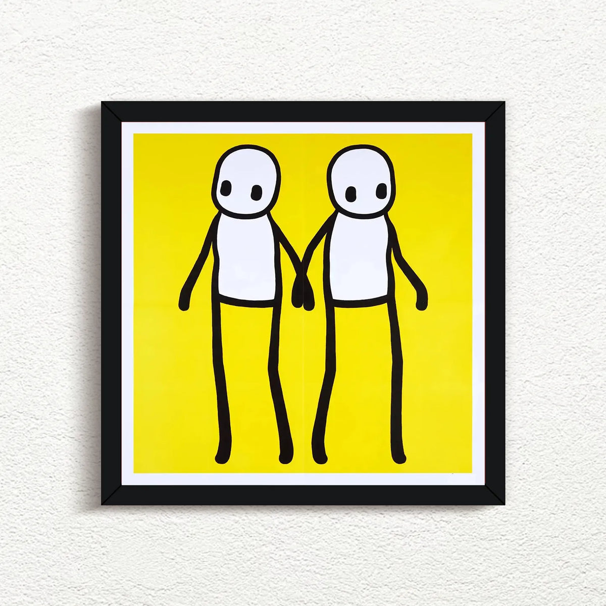 STIK, Holding Hands (Yellow), 2020 with black frame, prints for sale from Smolensky Gallery
