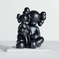 KAWS Shelter bronze figure holding a mini version of himself

