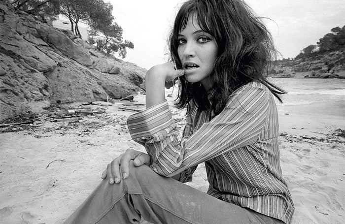 Terry O'Neill, Anna Karina at the beach, 1967 Limited edition fine art photograph by Terry O'Neill, featuring iconic portrait photography of celebrities and cultural figures. Available for sale at Smolensky Gallery