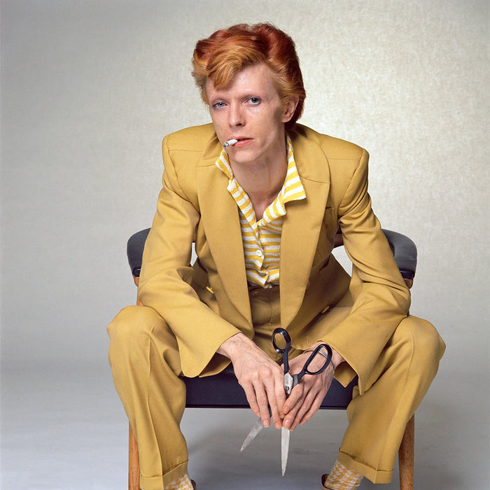 Terry O'Neill, David Bowie in a Freddie Burretti suit, 1974 Limited edition fine art photograph by Terry O'Neill, featuring iconic portrait photography of celebrities and cultural figures. Available for sale at Smolensky Gallery