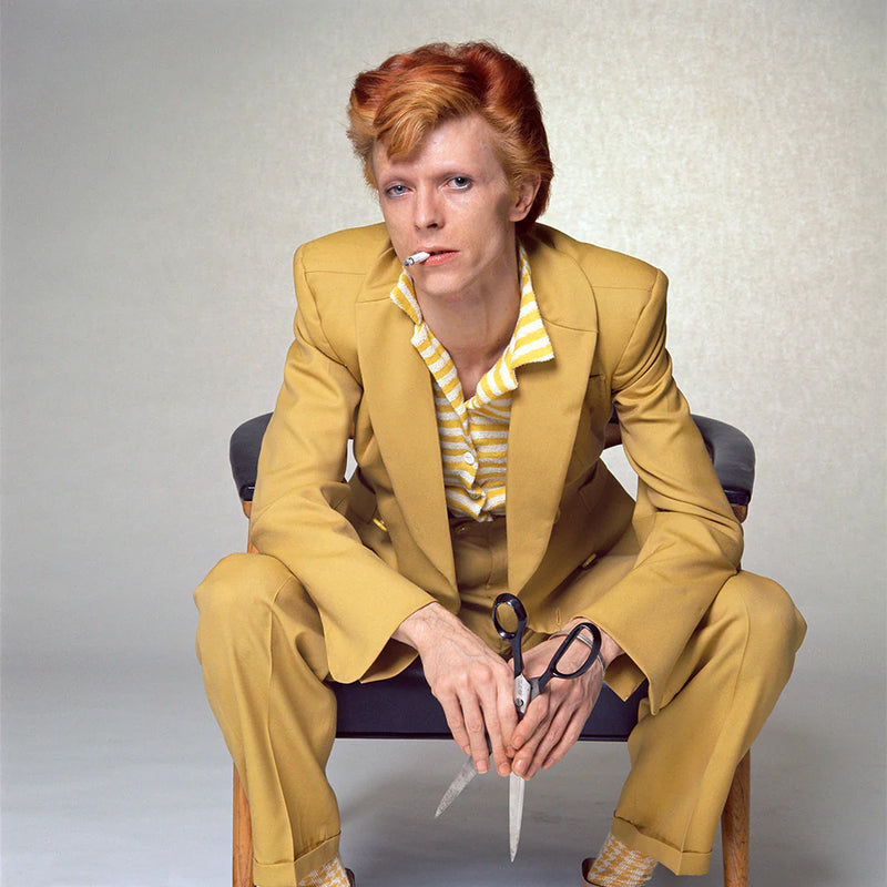 Terry O'Neill, David Bowie in a Freddie Burretti suit, 1974 Limited edition fine art photograph by Terry O'Neill, featuring iconic portrait photography of celebrities and cultural figures. Available for sale at Smolensky Gallery