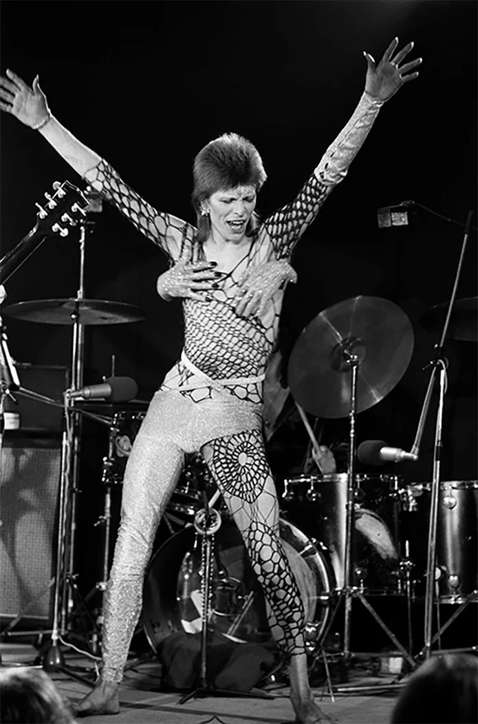 Terry O'Neill, David Bowie performing as Ziggy Stardust at the Marquee Club in London, 19 October 1973 Limited edition fine art photograph by Terry O'Neill, featuring iconic portrait photography of celebrities and cultural figures. Available for sale at Smolensky Gallery