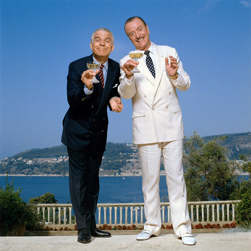 Terry O'Neill, Dirty Rotten Scoundrels, 1988 Limited edition fine art photograph by Terry O'Neill, featuring iconic portrait photography of celebrities and cultural figures. Available for sale at Smolensky Gallery