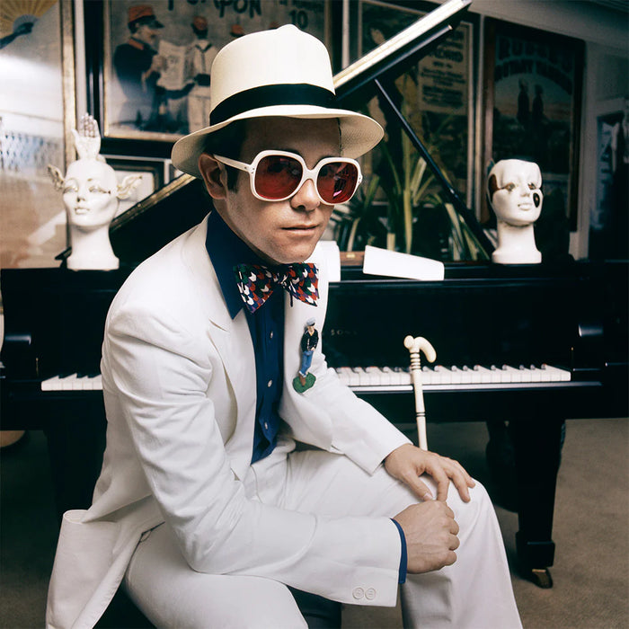 Terry O'Neill, Elton John at home in Windsor, 1974 Limited edition fine art photograph by Terry O'Neill, featuring iconic portrait photography of celebrities and cultural figures. Available for sale at Smolensky Gallery