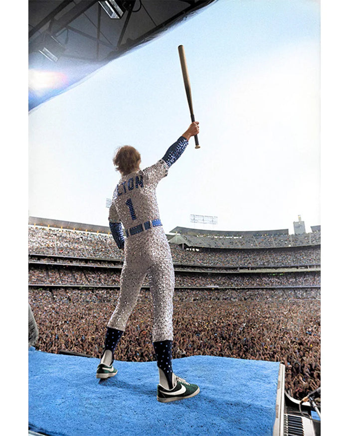 Terry O'Neill, Elton John standing on a piano (colorized), 1975 Limited edition fine art photograph by Terry O'Neill, featuring iconic portrait photography of celebrities and cultural figures. Available for sale at Smolensky Gallery
