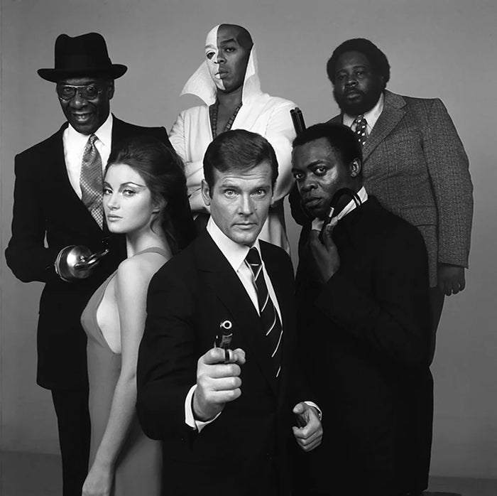 Terry O'Neill, English actor Roger Moore poses as superspy James Bond for film 'Live and Let Die', directed by Guy Hamilton, 1973. Limited edition fine art photograph by Terry O'Neill, featuring iconic portrait photography of celebrities and cultural figures. Available for sale at Smolensky Gallery