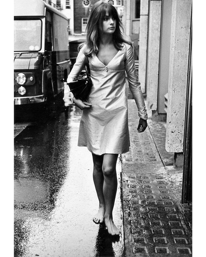 Terry O'Neill, Jean Shrimpton walking barefoot, 1965 Limited edition fine art photograph by Terry O'Neill, featuring iconic portrait photography of celebrities and cultural figures. Available for sale at Smolensky Gallery