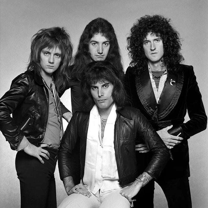 Terry O'Neill, Queen posing for a group photo, 1975 Limited edition fine art photograph by Terry O'Neill, featuring iconic portrait photography of celebrities and cultural figures. Available for sale at Smolensky Gallery