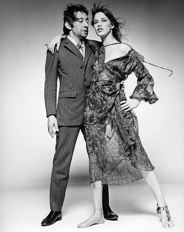 Terry O'Neill, Serge Gainsbourg and Jane Birkin standing for a shoot, 1970 Limited edition fine art photograph by Terry O'Neill, featuring iconic portrait photography of celebrities and cultural figures. Available for sale at Smolensky Gallery