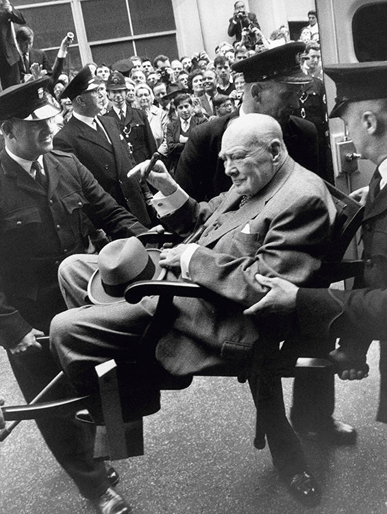 Terry O'Neill, Winston Churchill carried from an ambulance, 1962 Limited edition fine art photograph by Terry O'Neill, featuring iconic portrait photography of celebrities and cultural figures. Available for sale at Smolensky Gallery