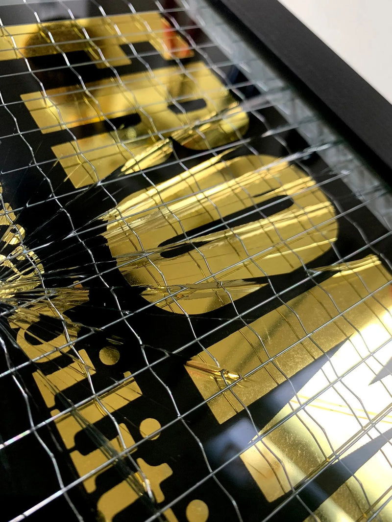 Embrace the art of controlled chaos with Mark Petty's A Glass Act (Gold). This limited edition screen print on reinforced wired glass features a reverse 2-color hand-pulled design with a striking 23.5ct gold gild. Each piece is meticulously smashed, layered up, and framed, creating a unique and unpredictable visual experience. Framed size is 27 x 32 cm. Each artwork comes with a signed plaque, displaying the title on the right side of the frame, and a signed certificate of authenticity on the back.