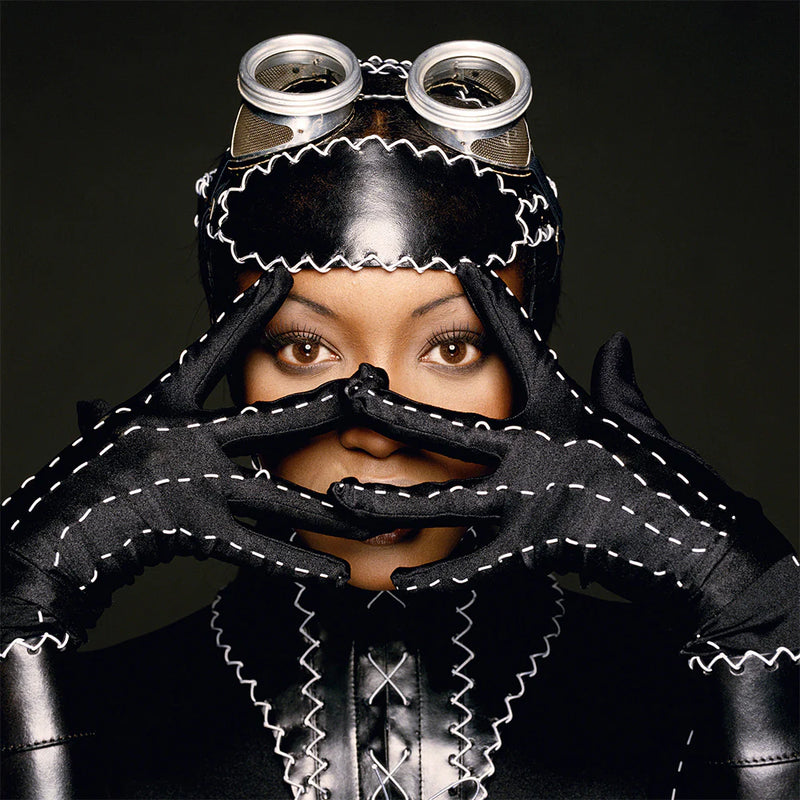 Terry O'Neill, Naomi Campbell peeking through her fingers, 1992